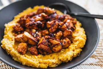 plant-based polenta with teriyaki tofu chunks