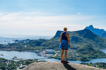 A enthusiastic hikers are mesmerized by the stunning and majestic Norwegian mountain views during a...