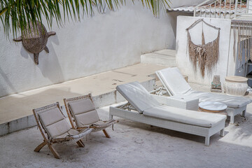outdoor space with lounging furniture, with beach chair and sunbed