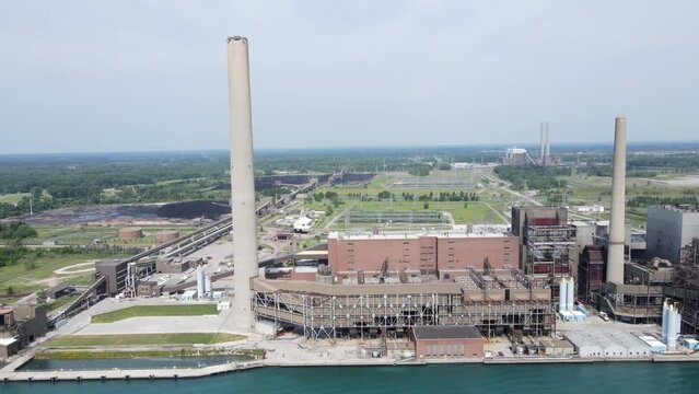 DTE St. Clair power plant building with massive chimneys, aerial drone view