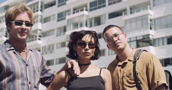 Portrait, group of gen z friends in city with trendy and cool style, identity and university culture with confidence. Streetwear, men and woman in urban fashion, freedom and students relax in summer.