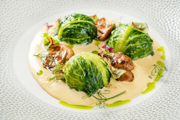 stuffed cabbage rolls with mushroom sauce