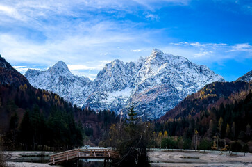 Autumn season with Jasna lake in Triglav national park at Kranjska Gora in Slovenia