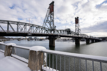 Hawthorne Bridge viewed from the west bank of the Willamette River in Portland, Oregon, after...