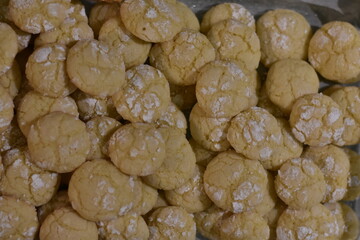 A Batch of Fresh Baked Lemon Cookies with Powdered Sugar