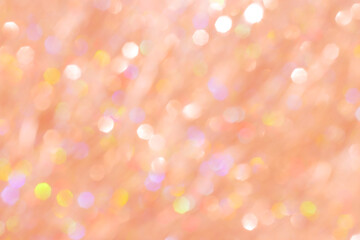 Abstract bokeh background peach colored, natural glare from lights, trend color year 2024 peach...