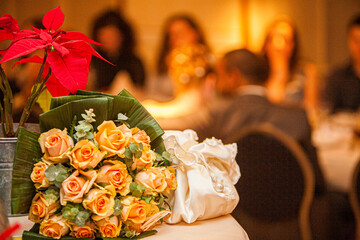 This image captures the essence of a celebratory gathering, focusing on a vibrant bouquet of...