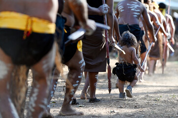 Indigenous Australians people marching on Laura Quinkan Dance Festival Cape York Queensland Australia