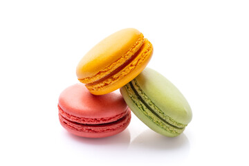 Sweet and colored macaroons on white background