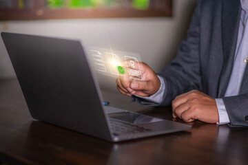 Document management system concept, Man using laptop with document icon concept for online document database. server, online storage.