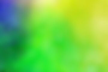 Abstract blurred background image of blue, green, yellow colors gradient used as an illustration. Designing posters or advertisements.