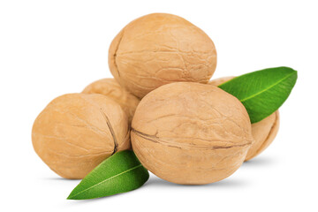  handful of walnuts with leaves is highlighted on a white background