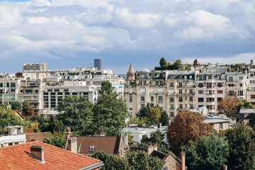 View of the Parisian rooftops and the Eiffel Tower from the 16th arrondissement of Paris - 691833743