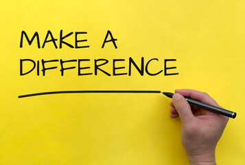 Make a difference text on yellow cover background. Copy space and make a difference concept