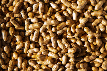 Overhead view of a pile of peanuts.