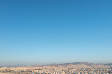 Athens Beneath the Azure: Expansive Skyline View