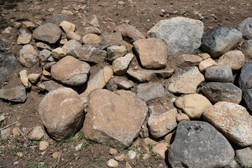 Rock retaining wall in backyard.  Designed to prevent erosion.