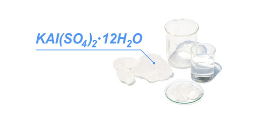 Alum Crystal with chemical formula, chemical ingredient on white laboratory table.