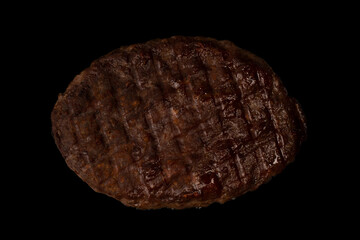 Cutlet with minced beef isolated on  black background.