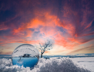 romantic winter landscape in a glass ball
