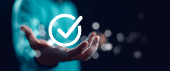 business man use tablet Quality management with Quality Assurance or QA and Quality Control or QC and improvement. Standardization and certification concept. Compliance to regulations and standards