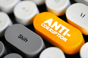 Anti-Corruption - comprises activities that oppose or inhibit corruption, text concept button on...