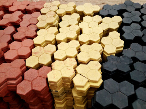 Stacks of concrete hexagonal Blocks or bricks, Holland interlocking paver hexagonal blocks.