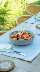 tomato salad served. healthy food at restaurant 