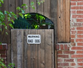 warning sign on the back gate