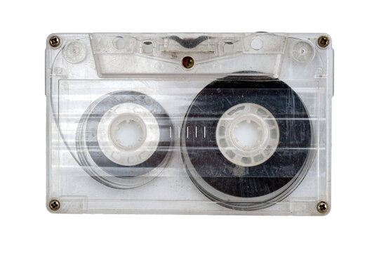 Dirty 90s plastic retro audio cassette isolated on white background