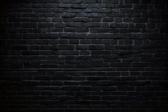 black brick wall in a dark room, with a single spotlight shining on it. The spotlight creates dramatic shadows and highlights on the rough texture of the bricks.
