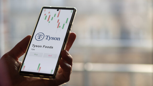 November 27st 2023 Springdale, Arkansas. The logo of Tyson Foods on the screen of an exchange. Tyson Foods price stocks, $TSN on a device.