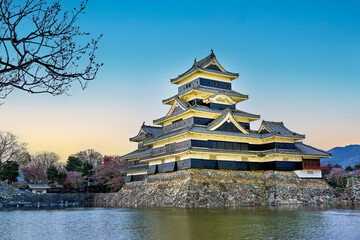 Japan. Matsumoto Castle at sunset - Powered by Adobe