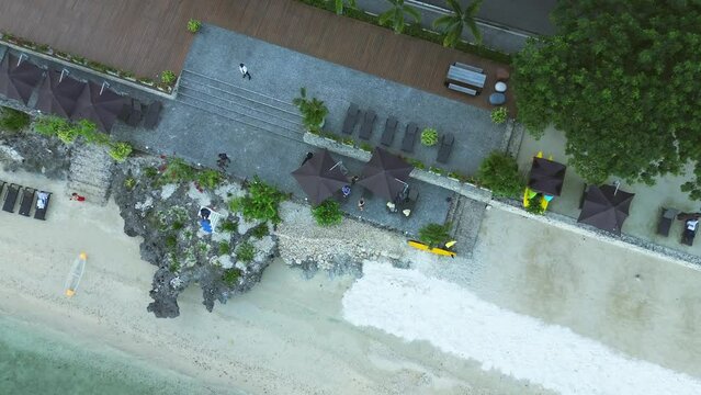 Aerial view of a resort in mactan cebu phil. with their white beach and blue skies on the horizon.