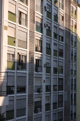 A fragment of the facade of an old apartment building in the city.