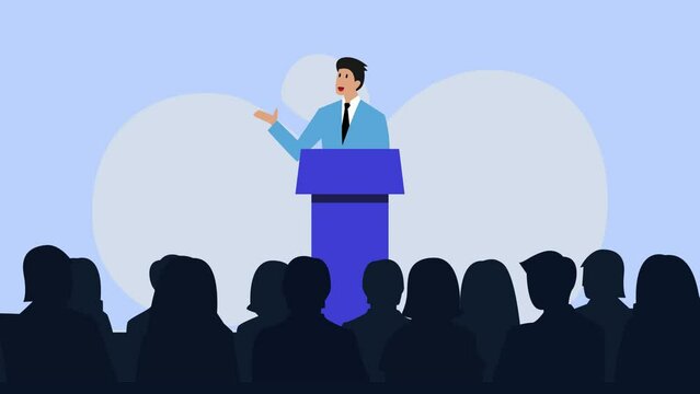 Speaker giving a speech from a lectern with microphones in front of an audience