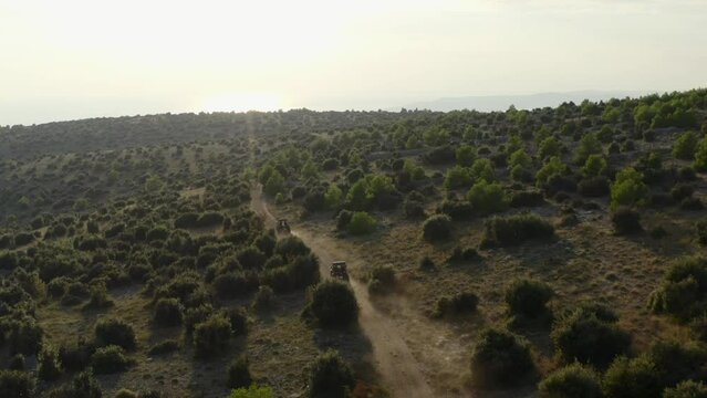 Off-road Buggy Adventure On The Unpaved Roads On The Remote Mountain In Brac Islands, Croatia. Aerial Drone Shot