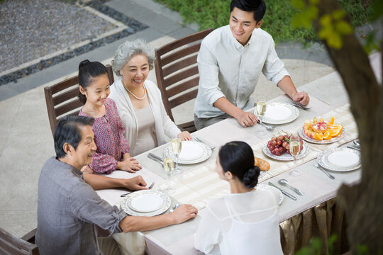 Family eating holiday meal together