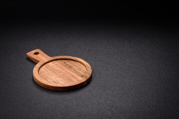 Empty wooden cutting board for preparing ingredients for preparing a delicious dish