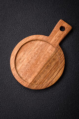 Empty wooden cutting board for preparing ingredients for preparing a delicious dish