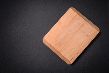 Empty wooden cutting board for preparing ingredients for preparing a delicious dish