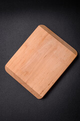 Empty wooden cutting board for preparing ingredients for preparing a delicious dish