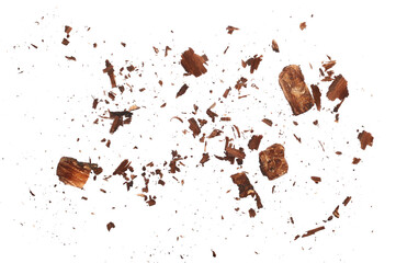 Rotten, old wood pieces and dust, scattered crushed tree bark isolated on white 

