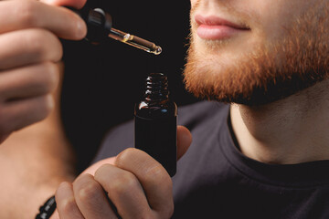 Spa oil for hair of beard man care in barber shop