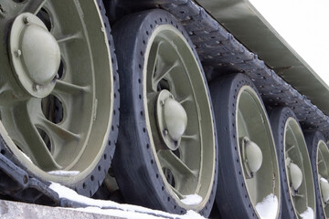 Wheels and tracks of a military tank