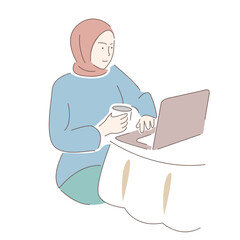 Fototapeta na wymiar Muslim girl working at the computer
