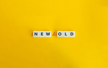 New and Old Antonyms. Text on Block Letter Tiles on Yellow Background. Minimalist Aesthetics. - obrazy, fototapety, plakaty