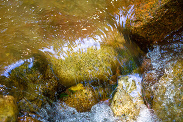 Experience the impressive power of nature in action. Witness the raw beauty of a mountain stream...