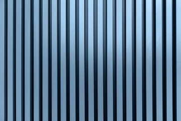 Modern stripped metal industrial blue background.