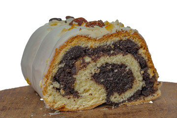 One piece of poppy seed roll isolated on white. Tasty cake